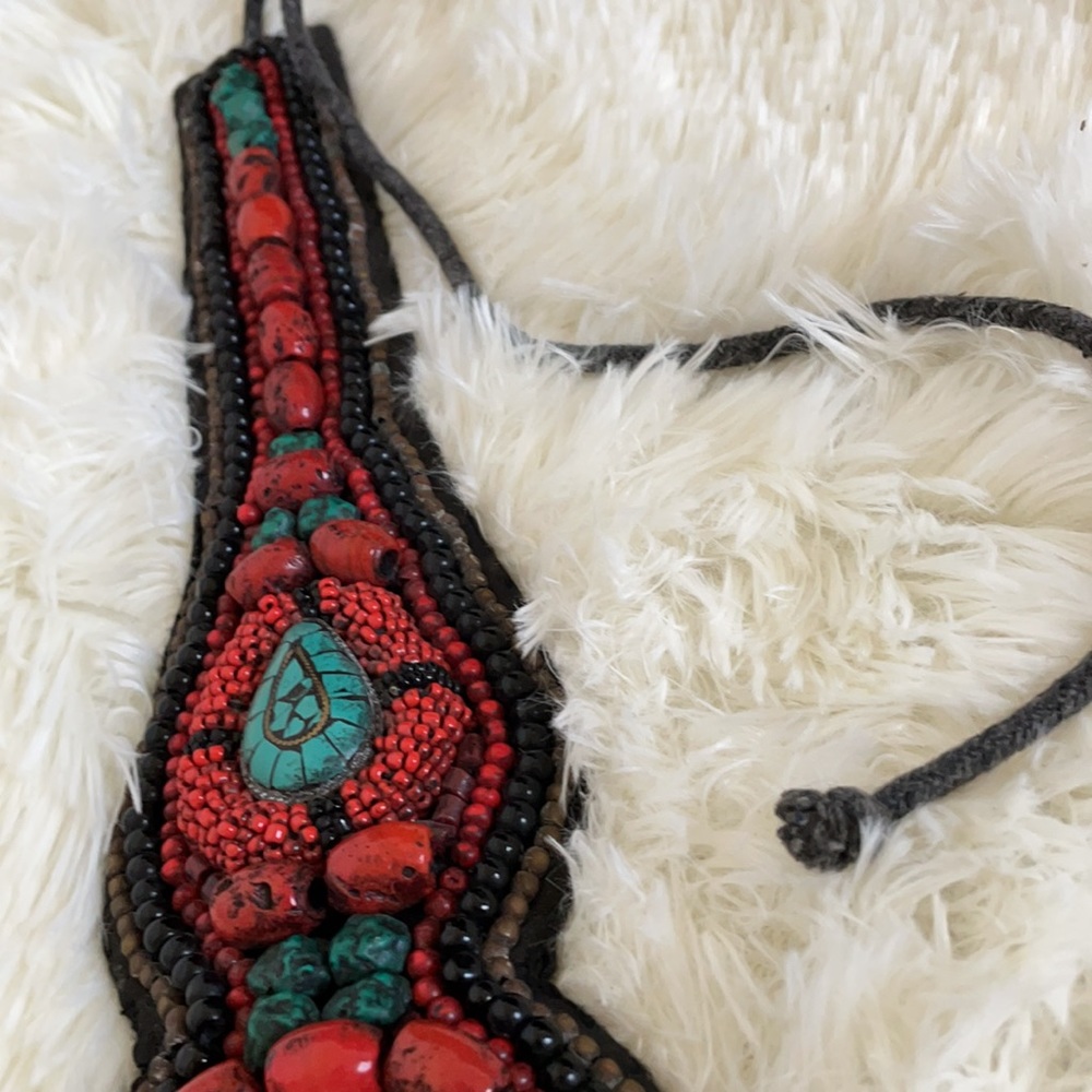 Beaded tie belt
